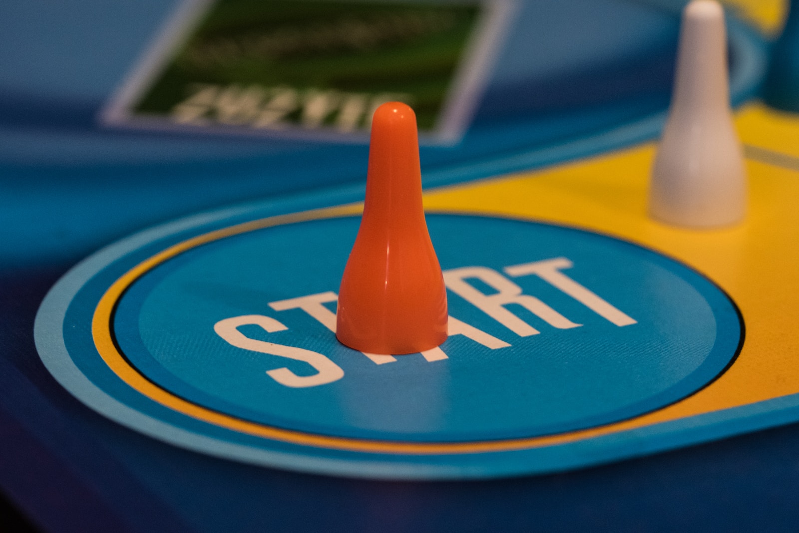 a close up of a game board with two cones